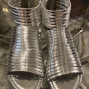 Silver flat sandals that zips in the back